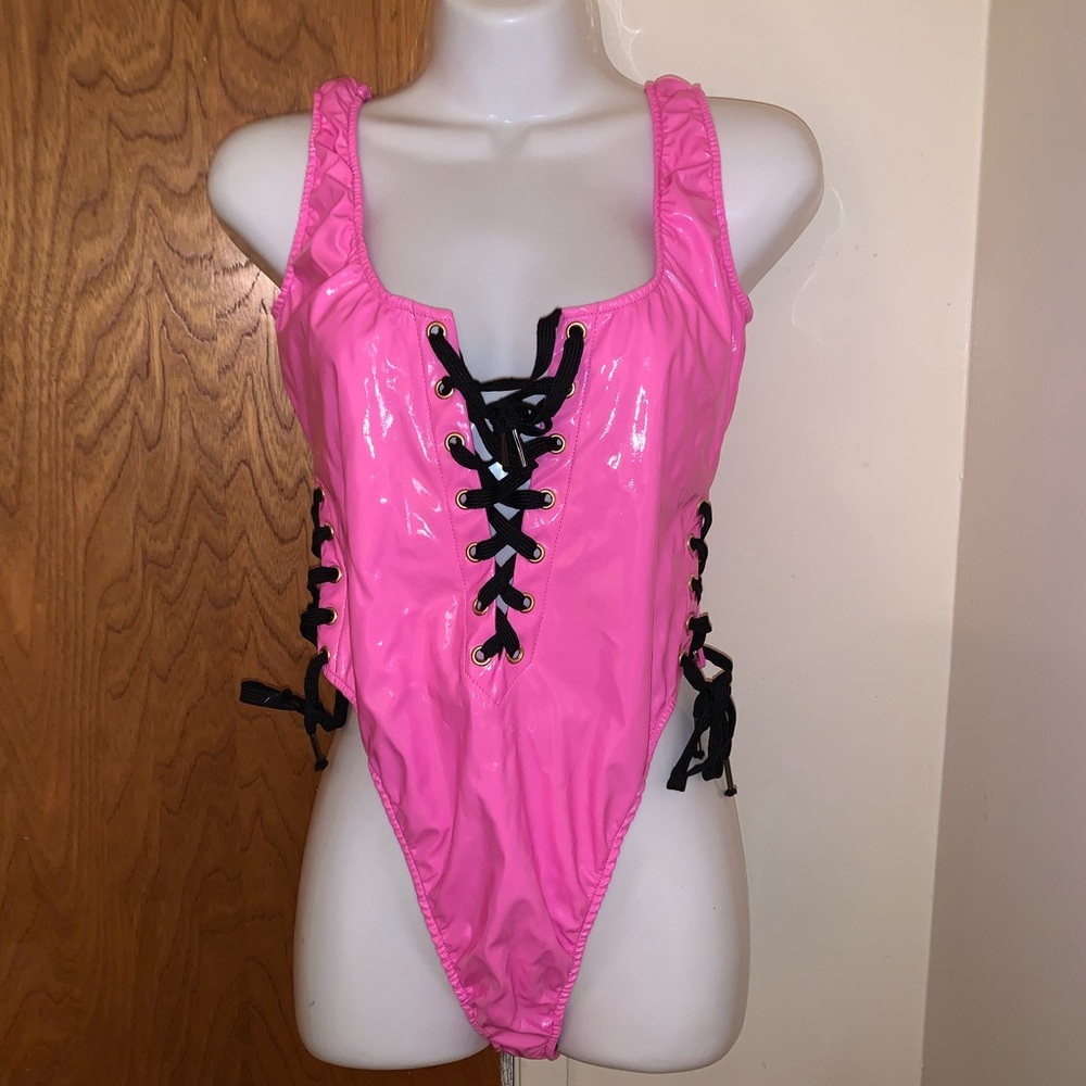 DOLLSKILL POSTER GIRL PINK VINYL TIE BODYSUIT